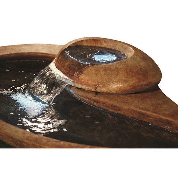 Close up of water River Stone Fountain boasts a swirling and swooping design